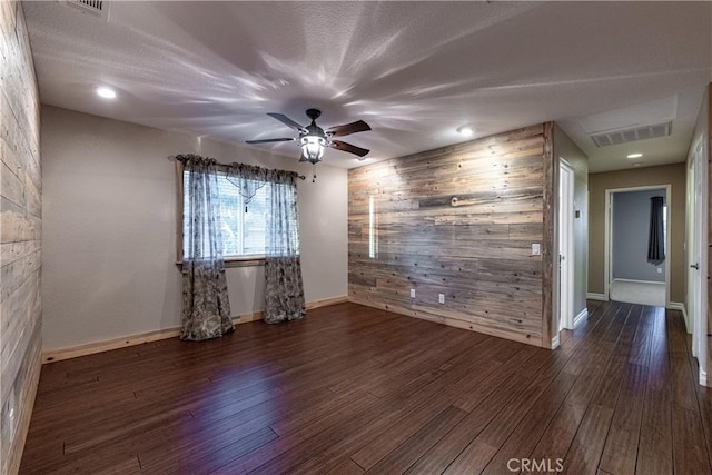 35467 Meadow Park Cir, Wildomar, CA 92595 - empty room featuring wooden walls, wood finished floors, and a ceiling fan