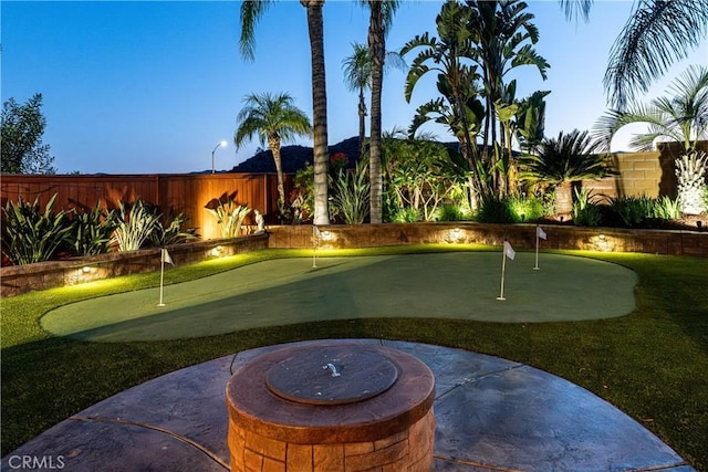 35467 Meadow Park Cir, Wildomar, CA 92595 - fenced backyard featuring an area to practice putting