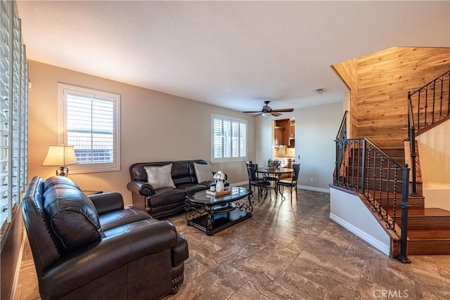 35467 Meadow Park Cir, Wildomar, CA 92595 - living area featuring stairs, stone finish floors, and ceiling fan
