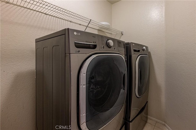 35467 Meadow Park Cir, Wildomar, CA 92595 - laundry room featuring washer and clothes dryer and tile patterned floors