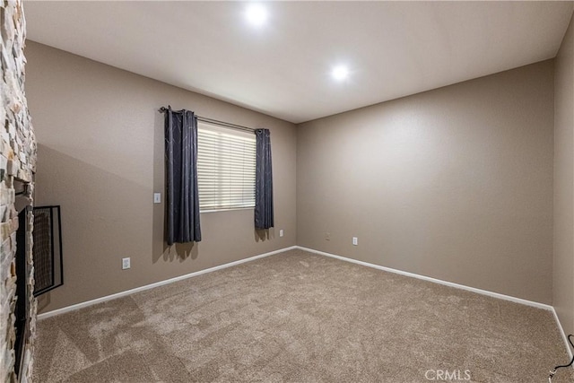 35467 Meadow Park Cir, Wildomar, CA 92595 - carpeted empty room with baseboards and a stone fireplace