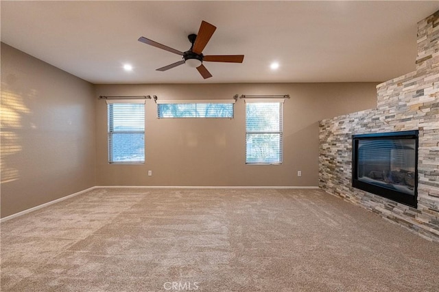 35467 Meadow Park Cir, Wildomar, CA 92595 - unfurnished living room with a ceiling fan, plenty of natural light, a stone fireplace, and carpet