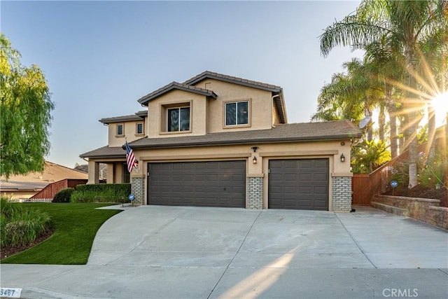 35467 Meadow Park Cir, Wildomar, CA 92595 - traditional-style home with stucco siding, driveway, an attached garage, and a front lawn
