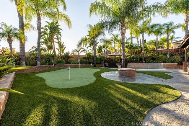 35467 Meadow Park Cir, Wildomar, CA 92595 - view of property's community featuring a putting green, a patio area, and an outdoor fire pit