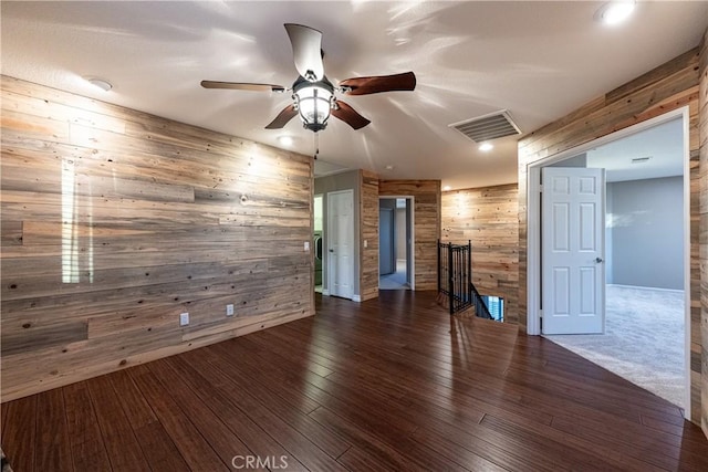 35467 Meadow Park Cir, Wildomar, CA 92595 - unfurnished room featuring wooden walls, ceiling fan, and wood finished floors
