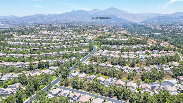 22681 Maplewood, Mission Viejo, CA 92692 - aerial overview of property's location with mountains and nearby suburban area
