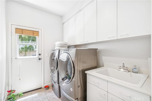 22681 Maplewood, Mission Viejo, CA 92692 - washroom featuring separate washer and dryer, cabinet space, and light tile patterned floors