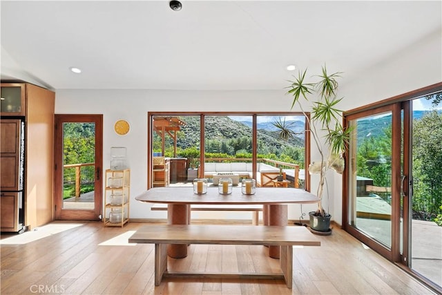 24537 Dry Canyon Cold Creek Rd, Calabasas, CA 91302 - dining area featuring light wood-type flooring, healthy amount of natural light, recessed lighting, and a mountain view