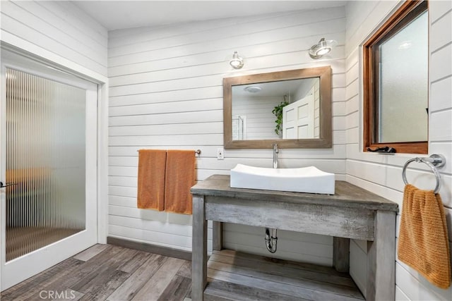24537 Dry Canyon Cold Creek Rd, Calabasas, CA 91302 - bathroom featuring wood finished floors and wooden walls