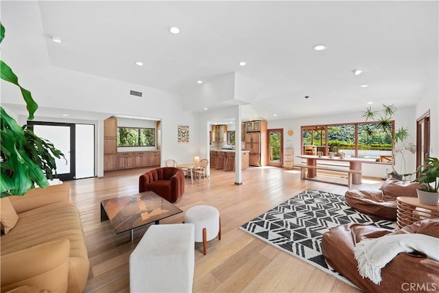 24537 Dry Canyon Cold Creek Rd, Calabasas, CA 91302 - living room with recessed lighting and light wood-style floors