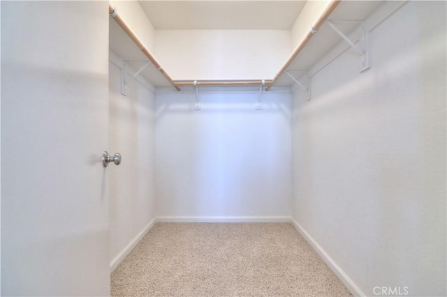 2062 Dunbar Way, Dinuba, CA 93618 - spacious closet featuring carpet