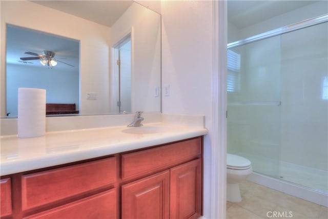 2062 Dunbar Way, Dinuba, CA 93618 - full bath with vanity, a shower stall, ceiling fan, and tile patterned floors