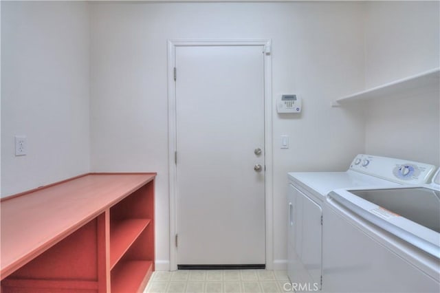 2062 Dunbar Way, Dinuba, CA 93618 - laundry area with washer and clothes dryer and light flooring