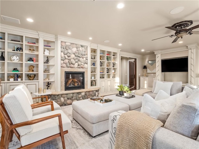 6550 N Blackhawk Ln, Clovis, CA 93619 - living area featuring recessed lighting, a ceiling fan, ornamental molding, a fireplace, and built in shelves