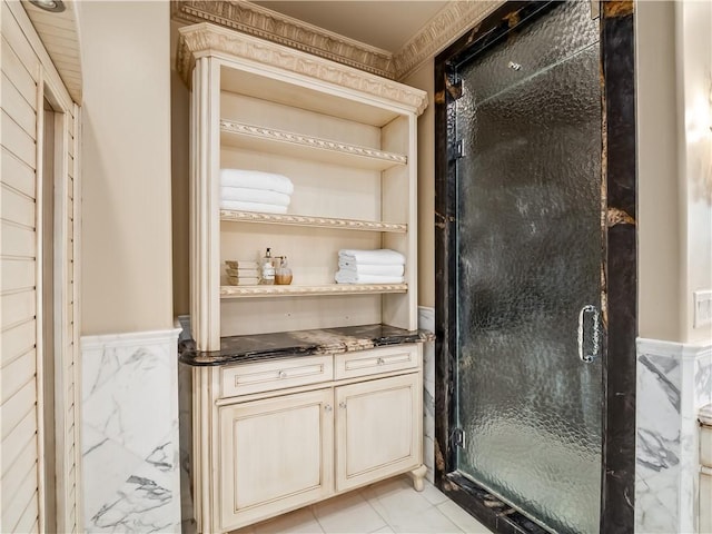 6550 N Blackhawk Ln, Clovis, CA 93619 - bathroom featuring wainscoting, a stall shower, and ornamental molding