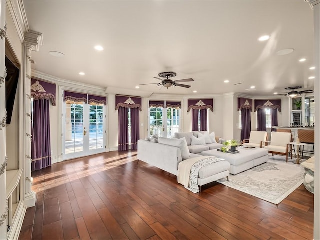 6550 N Blackhawk Ln, Clovis, CA 93619 - living room featuring a ceiling fan, crown molding, recessed lighting, dark wood-style floors, and french doors
