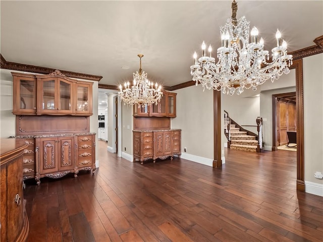 6550 N Blackhawk Ln, Clovis, CA 93619 - dining space with a chandelier, stairway, dark wood-style flooring, and ornamental molding