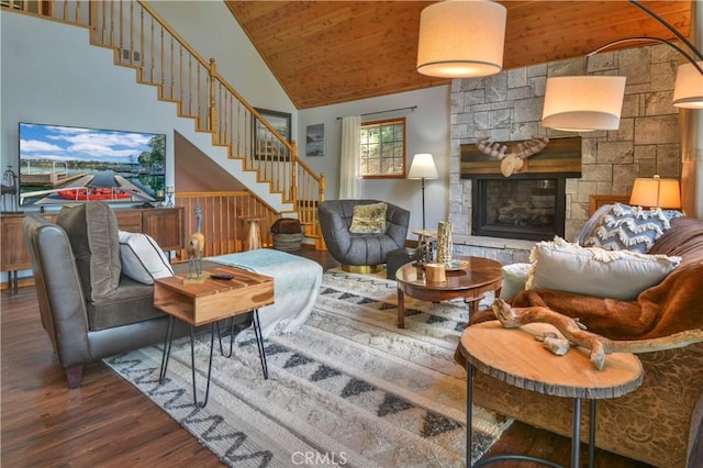 26873 Huron Rd, Lake Arrowhead, CA 92317 - living room featuring wood finished floors, stairs, wood ceiling, a stone fireplace, and high vaulted ceiling