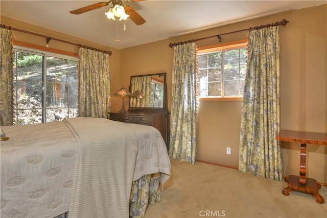 26873 Huron Rd, Lake Arrowhead, CA 92317 - carpeted bedroom with multiple windows and ceiling fan