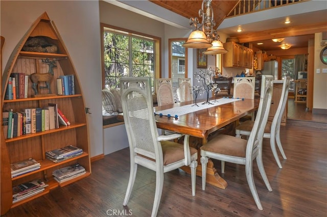 26873 Huron Rd, Lake Arrowhead, CA 92317 - dining space featuring wood finished floors and vaulted ceiling