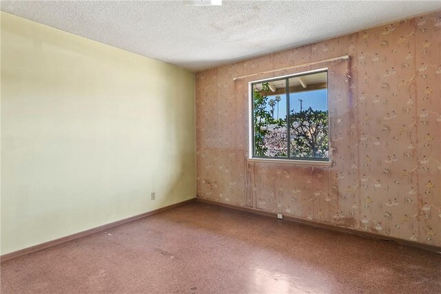 1341 E Monroe, Orange, CA 92867 - unfurnished room featuring a textured ceiling and baseboards