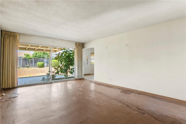 1341 E Monroe, Orange, CA 92867 - spare room with plenty of natural light and a textured ceiling