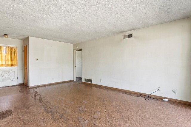 1341 E Monroe, Orange, CA 92867 - unfurnished room with baseboards and a textured ceiling