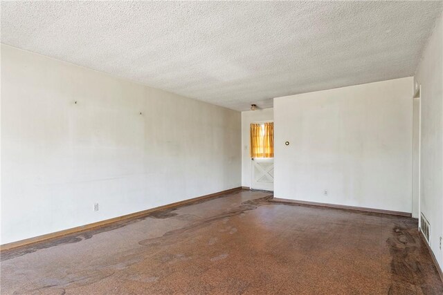 1341 E Monroe, Orange, CA 92867 - carpeted spare room with baseboards and a textured ceiling