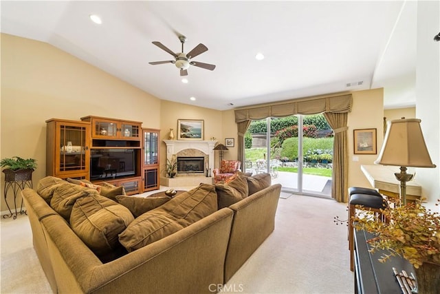 665 Silver Charm Dr, Arroyo Grande, CA 93420 - living area with light carpet, vaulted ceiling, ceiling fan, a fireplace with raised hearth, and recessed lighting