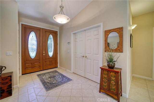 665 Silver Charm Dr, Arroyo Grande, CA 93420 - entrance foyer with light tile patterned floors and baseboards