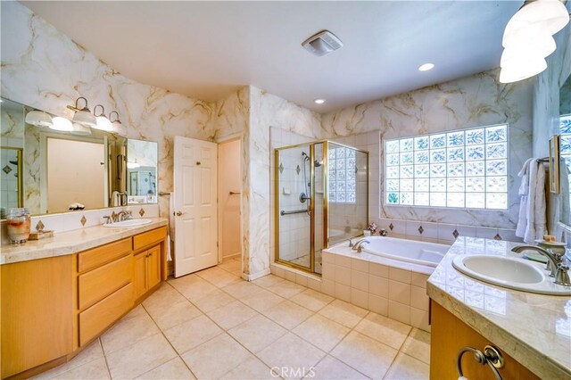 665 Silver Charm Dr, Arroyo Grande, CA 93420 - bathroom featuring vanity, a bath, a stall shower, tile patterned flooring, and recessed lighting