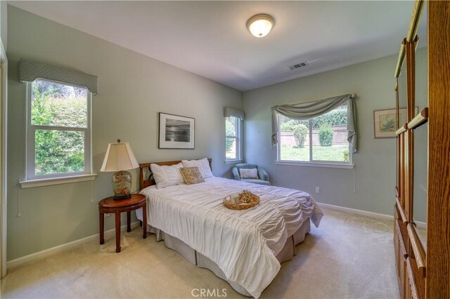 665 Silver Charm Dr, Arroyo Grande, CA 93420 - bedroom featuring light carpet and baseboards