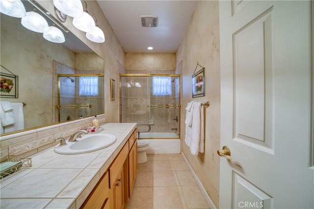 665 Silver Charm Dr, Arroyo Grande, CA 93420 - full bathroom with vanity, tile patterned flooring, and shower / bath combination with glass door