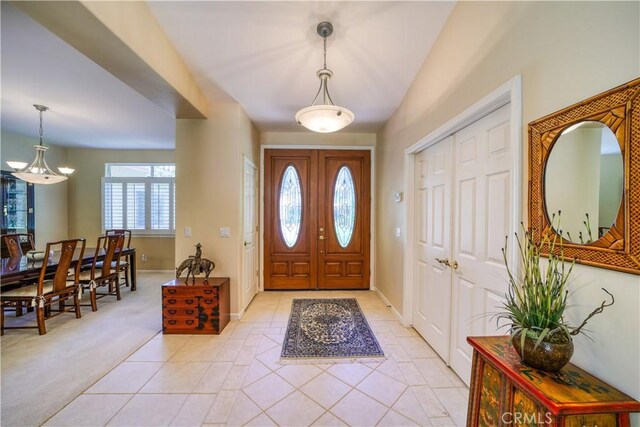 665 Silver Charm Dr, Arroyo Grande, CA 93420 - entrance foyer with light carpet and light tile patterned floors