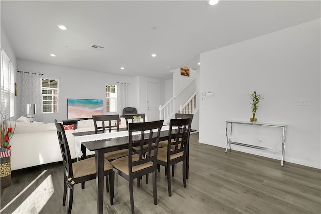 8595 Founders Grove St, Chino, CA 91708 - dining room featuring recessed lighting, wood finished floors, and stairway