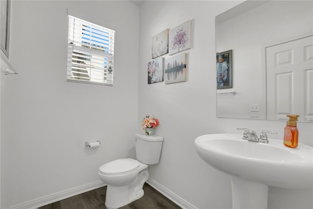 8595 Founders Grove St, Chino, CA 91708 - bathroom featuring toilet and wood finished floors