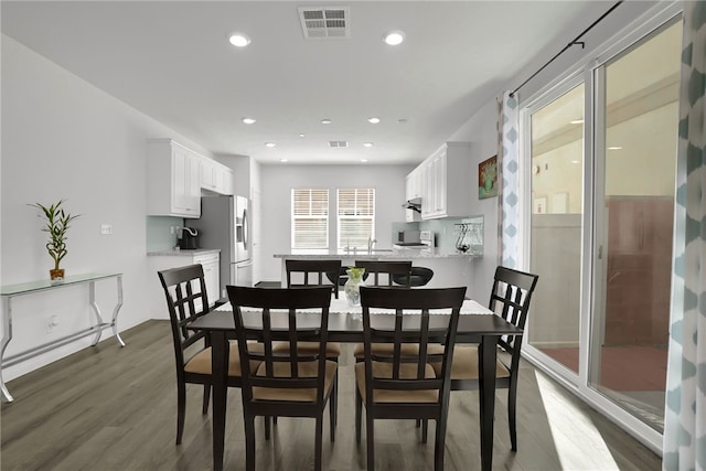 8595 Founders Grove St, Chino, CA 91708 - dining area with dark wood-style flooring and recessed lighting