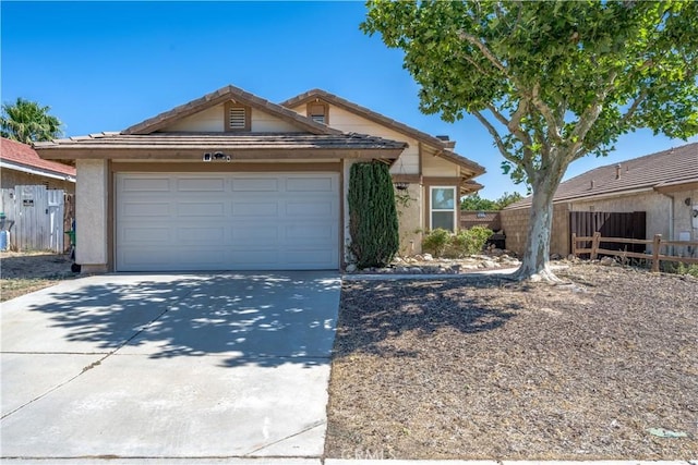 2917 Fairfield Ave, Palmdale, CA 93550 - single story home with concrete driveway, stucco siding, and a garage