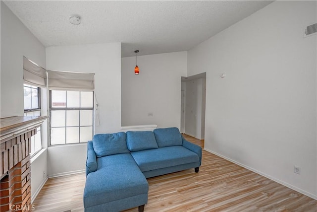 2917 Fairfield Ave, Palmdale, CA 93550 - sitting room with wood finished floors and a textured ceiling