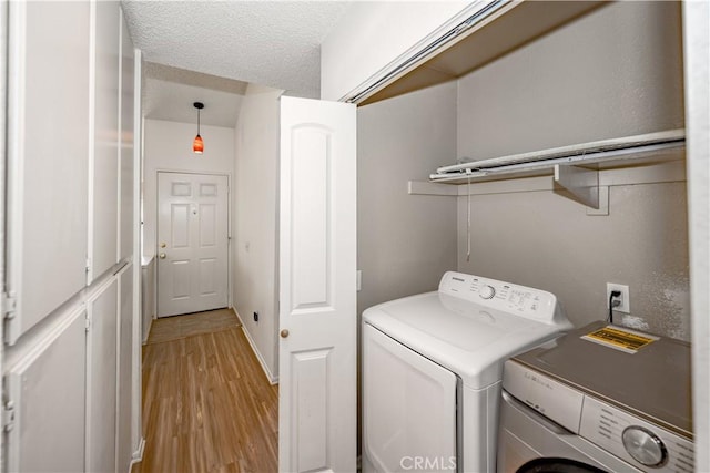 2917 Fairfield Ave, Palmdale, CA 93550 - washroom featuring washer and dryer and light wood-style floors