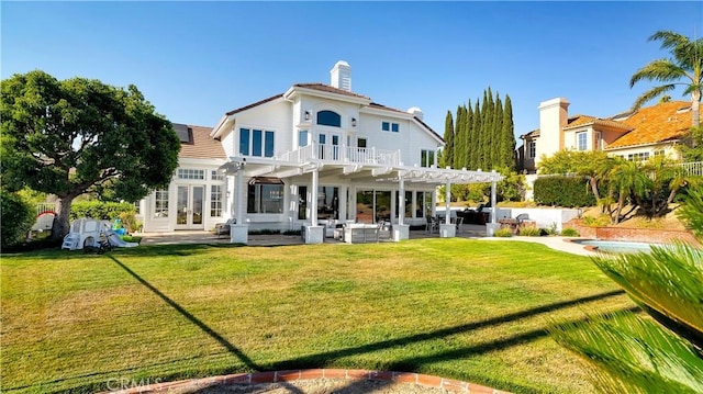 4855 Green Crest Dr, Yorba Linda, CA 92887 - back of property featuring french doors, a pergola, a patio area, an outdoor hangout area, and a yard