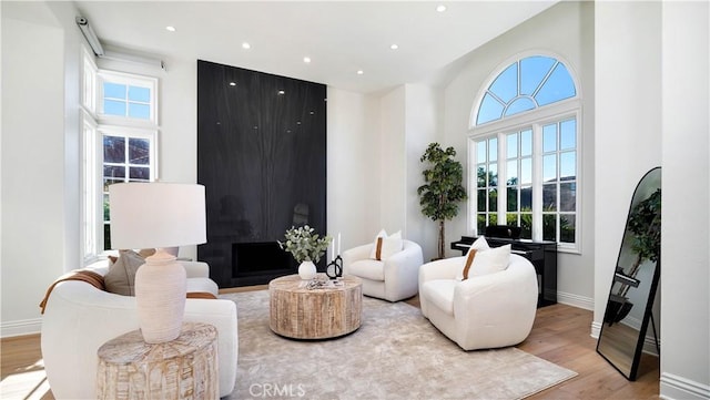 4855 Green Crest Dr, Yorba Linda, CA 92887 - living room featuring wood finished floors, plenty of natural light, recessed lighting, and a high ceiling