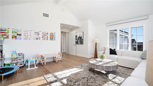 4855 Green Crest Dr, Yorba Linda, CA 92887 - living area featuring wood finished floors, beam ceiling, and high vaulted ceiling