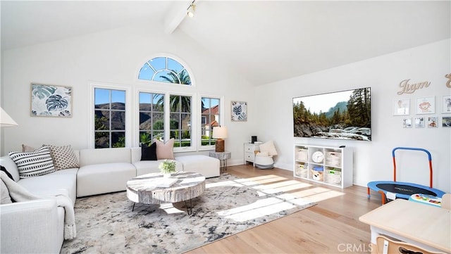 4855 Green Crest Dr, Yorba Linda, CA 92887 - living room featuring beamed ceiling, wood finished floors, high vaulted ceiling, and track lighting