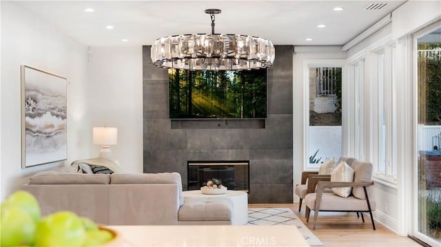 4855 Green Crest Dr, Yorba Linda, CA 92887 - living room with wood finished floors, a chandelier, recessed lighting, and a fireplace