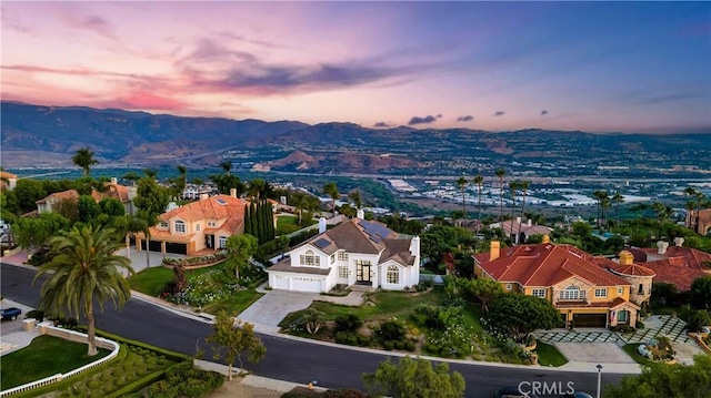 4855 Green Crest Dr, Yorba Linda, CA 92887 - aerial view at dusk of a residential view and a mountain view