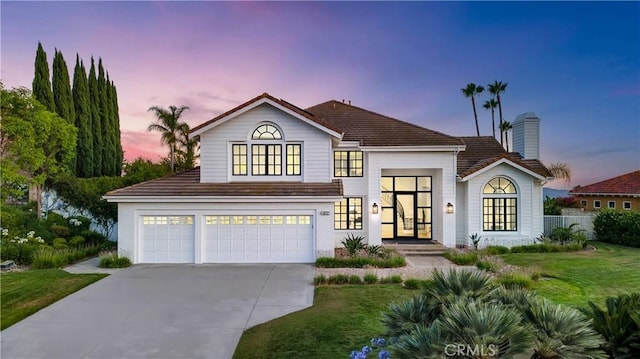4855 Green Crest Dr, Yorba Linda, CA 92887 - view of front facade featuring concrete driveway, an attached garage, a chimney, and a yard