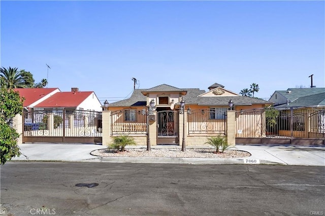 7060 Morse Ave, North Hollywood, CA 91605 - bungalow featuring a fenced front yard and a gate