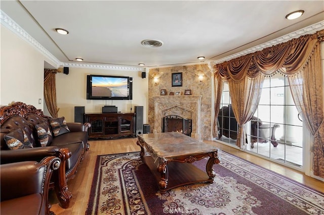 7060 Morse Ave, North Hollywood, CA 91605 - living room with wood finished floors, a premium fireplace, and crown molding