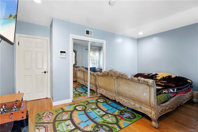 7060 Morse Ave, North Hollywood, CA 91605 - bedroom featuring hardwood / wood-style floors, a closet, and recessed lighting